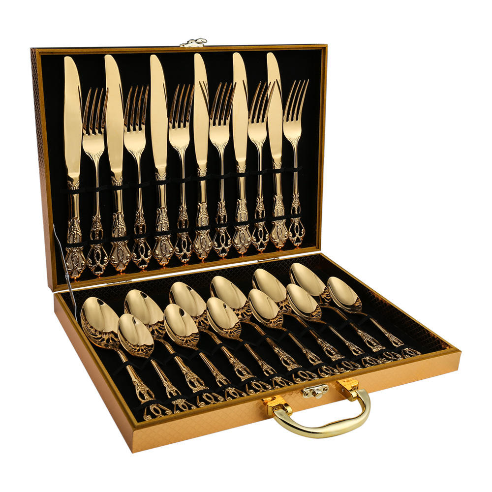 baroque royal gold cutlery set displayed in luxury gift box
