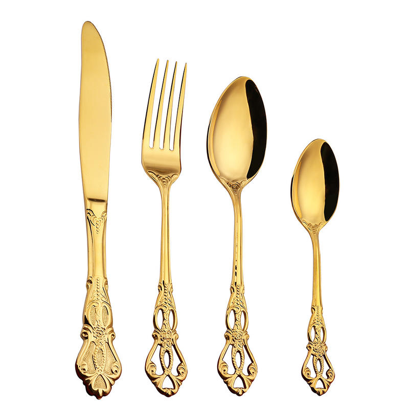 baroque style gold flatware ornate handle detail