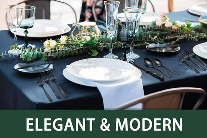 black hammered stainless steel flatware set on modern table
