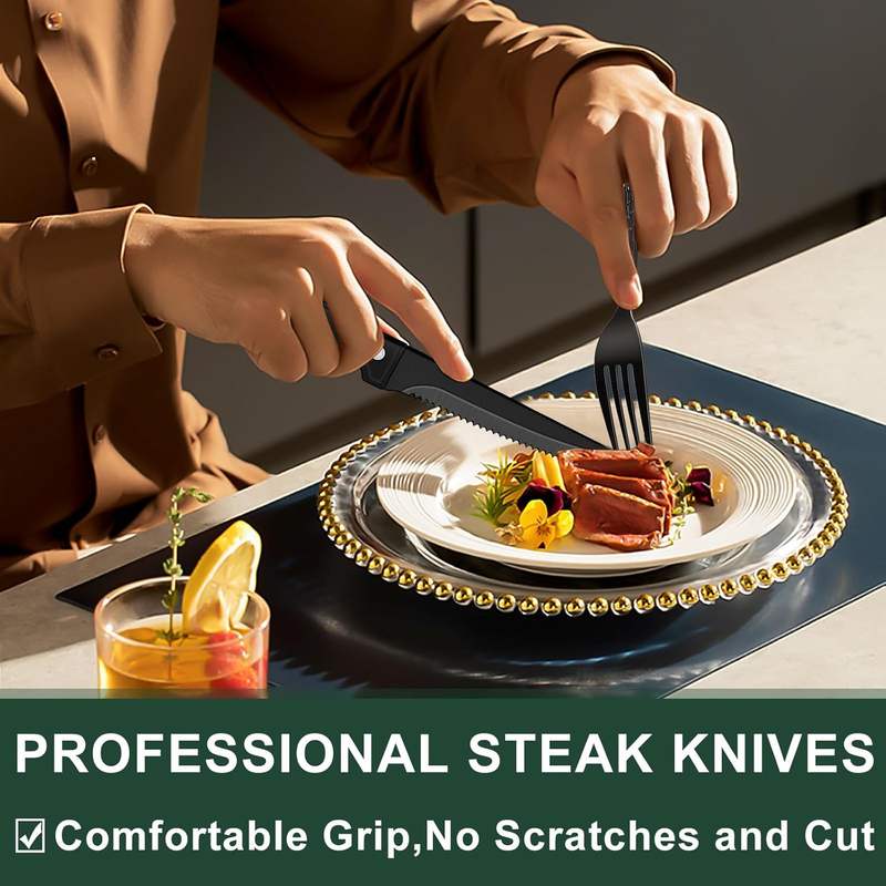 black stainless steel steak knives cutting steak
