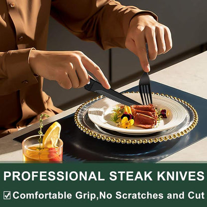 black stainless steel steak knives cutting steak
