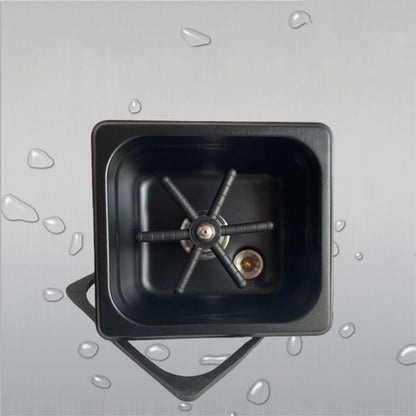 Close-up view of integrated cup rinser head on the portable matte black sink for efficient cleaning of cups and glasses.