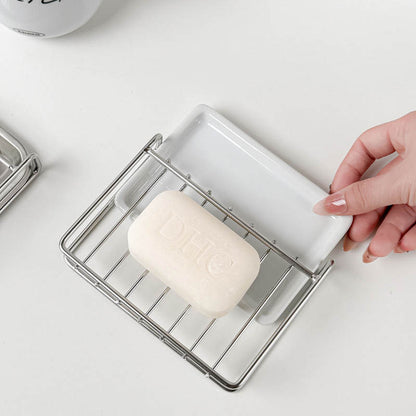 Easily cleanable stainless steel soap holder with soap saver pad
