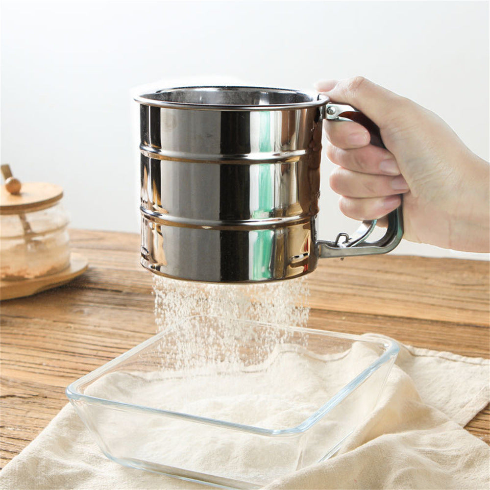 stainless steel flour sifter used for baking dough