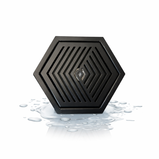 Hexagonal black stainless steel drip tray, 155mm, designed for modern coffee bars and small drink stations.