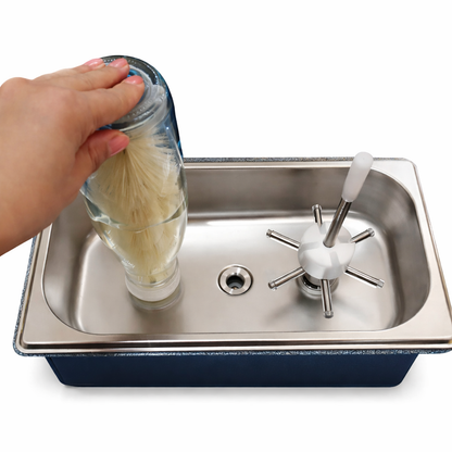 Base and basin of the portable bottle rinser, designed for easy placement on countertops or inside sinks.