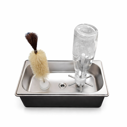 Portable bottle rinser with brush and bottle for high-pressure rinsing, perfect for no-drill installation in kitchens and bars.