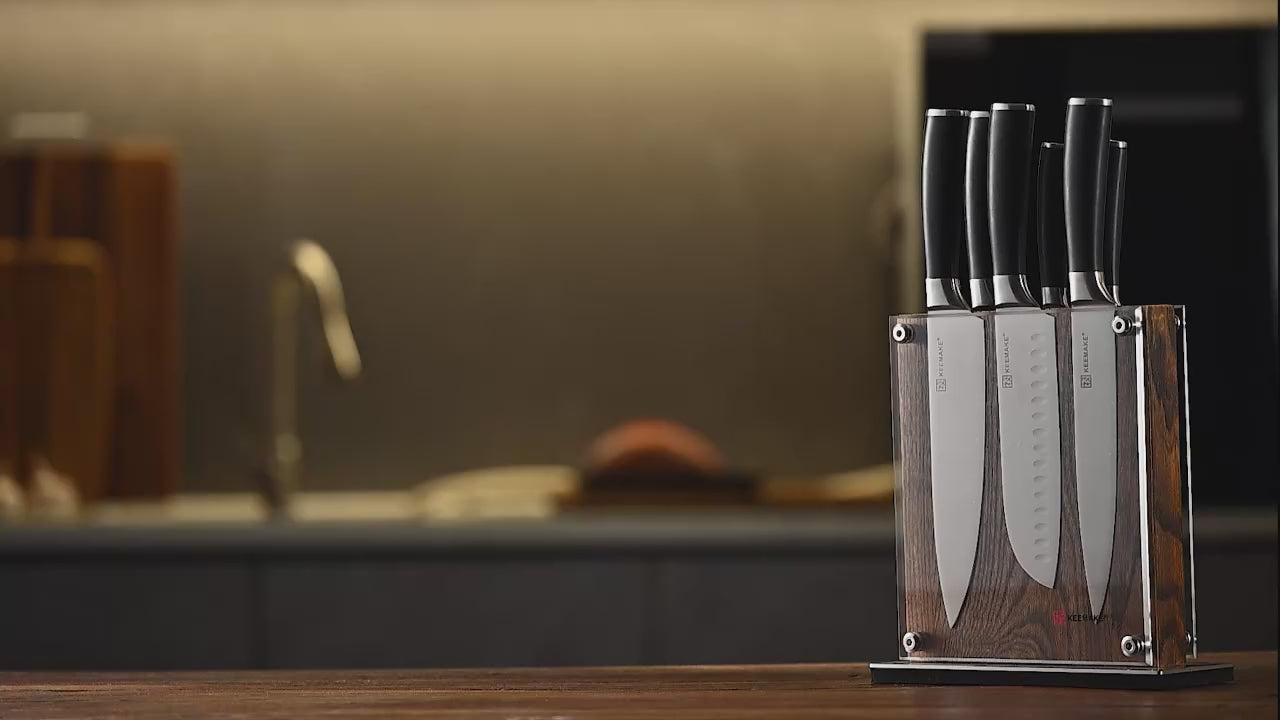 stainless steel knife block set with transparent holder on kitchen counter