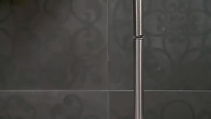 modern stainless steel toilet paper holder in bathroom
