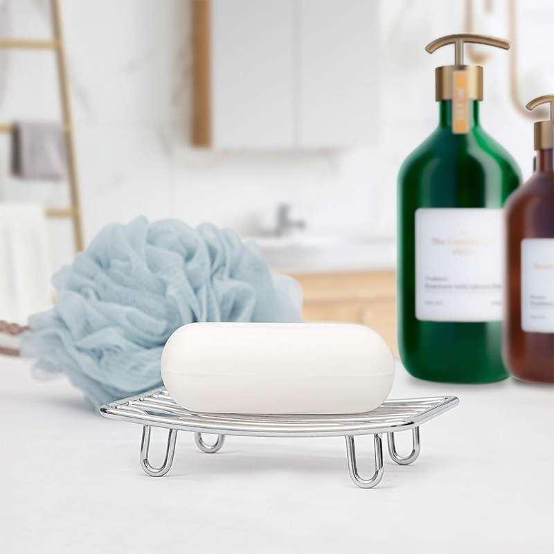 Stainless steel soap holder placed on bathroom countertop for organized storage