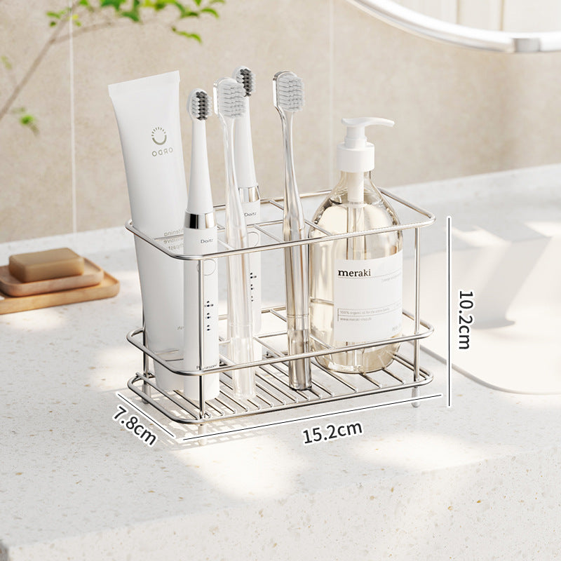 Stainless steel toothbrush holder organizer placed near bathroom sink